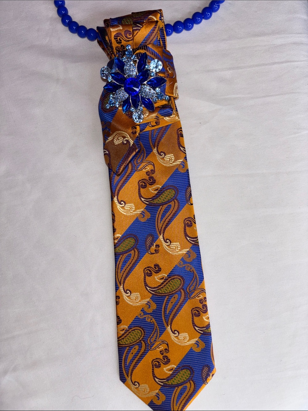 Hand Crafted Gold and Blue Paisley Silk Tie with Jewel Accent